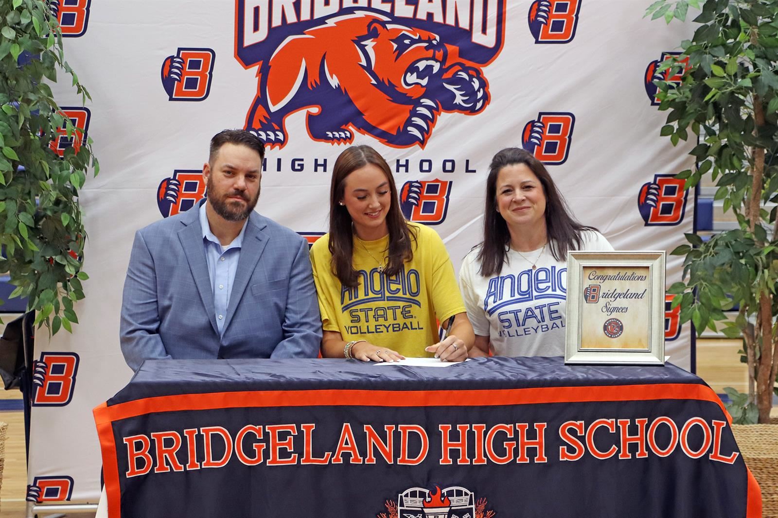 Bridgeland High School senior Amelia Creacy, center, signed her letter of intent to play volleyball at Angelo State.
